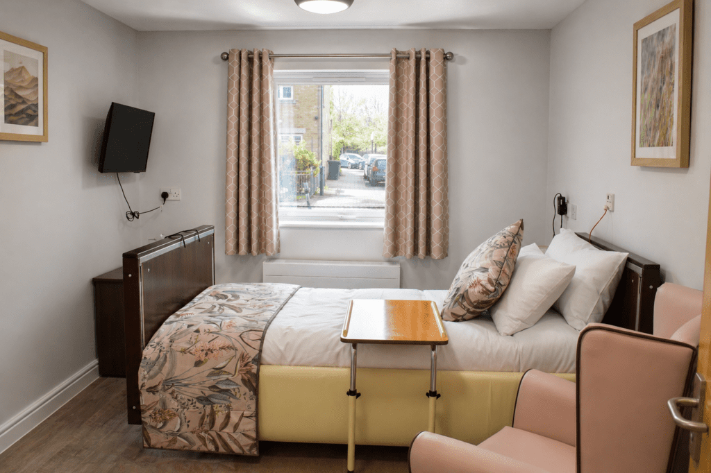 Comfortable room at Willesden Court Care Home with modern amenities.