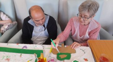 St Patrick’s Day Craft Activities at Brackenbridge House Residents preparing festive decorations with crafts for St Patrick’s Day.