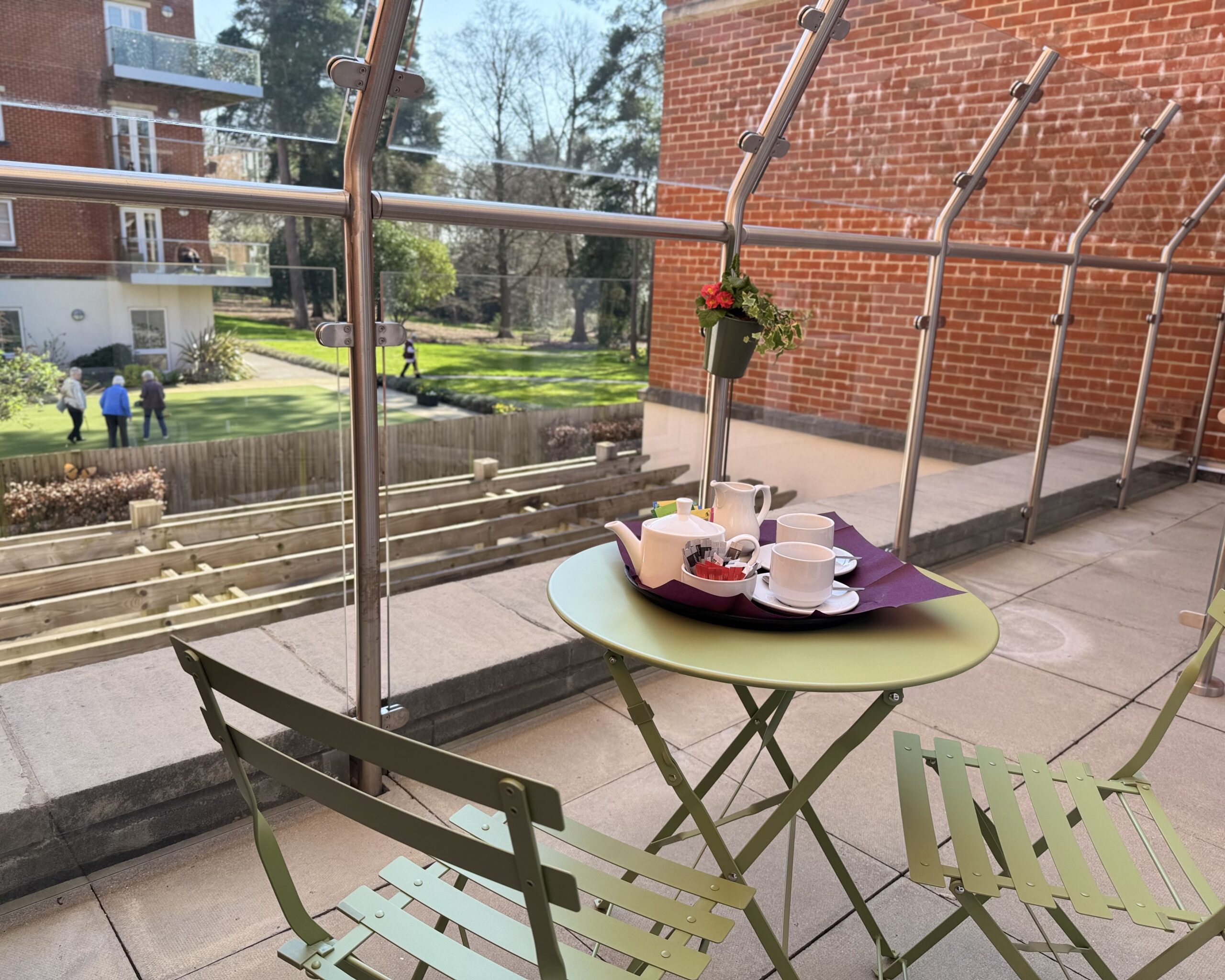 Lynwood Care Centre: Scenic Outdoor Dining Space with Tea and Scones