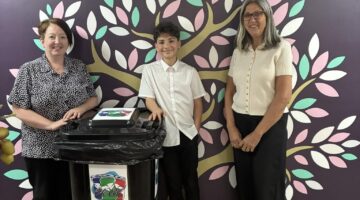 School recycling initiative with students and teachers at charity drop off