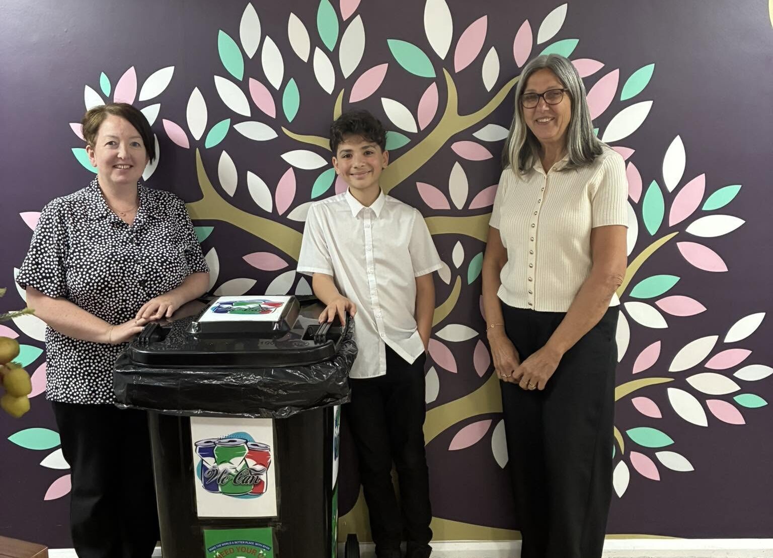 School recycling initiative with students and teachers at charity drop off
