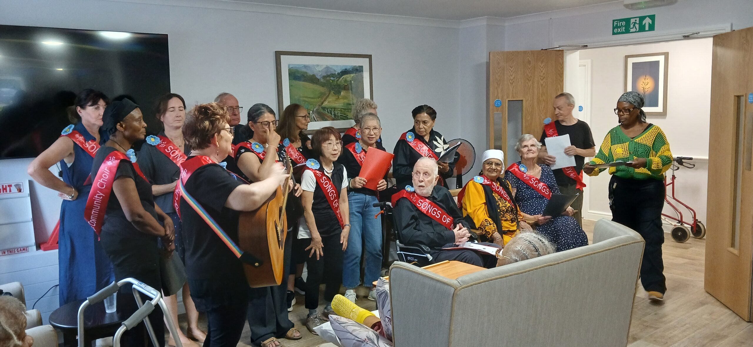 Residents and choir sing together at Willesden Court care home