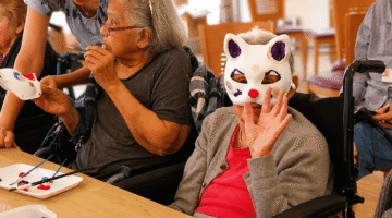 Elderly art therapy on the Lynwood Explorer with Venetian masks