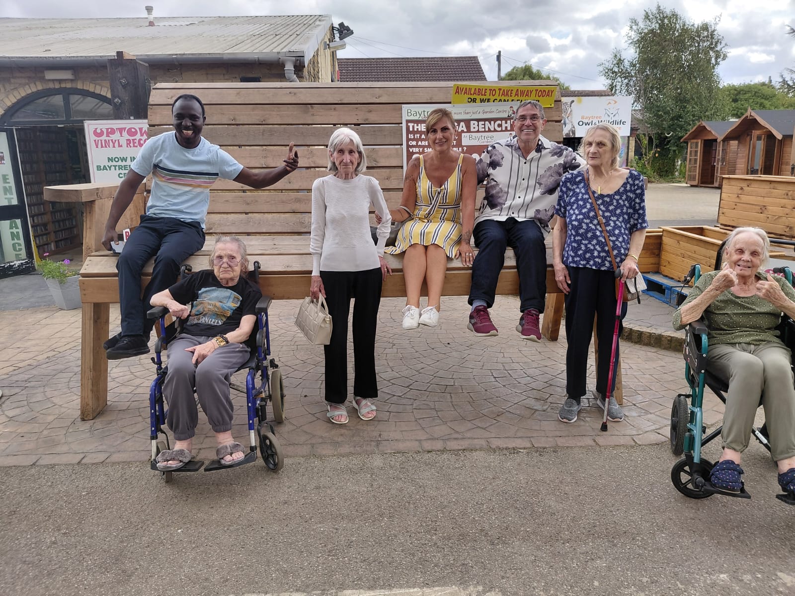 Seniors enjoying outdoor community day at Baytree care home