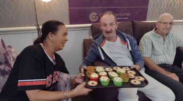 Autumn Vale Care Centre residents enjoy charity cake for Macmillan